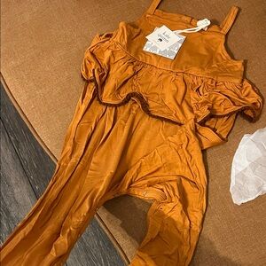 Kate Quinn Rust Ruffle Jumpsuit